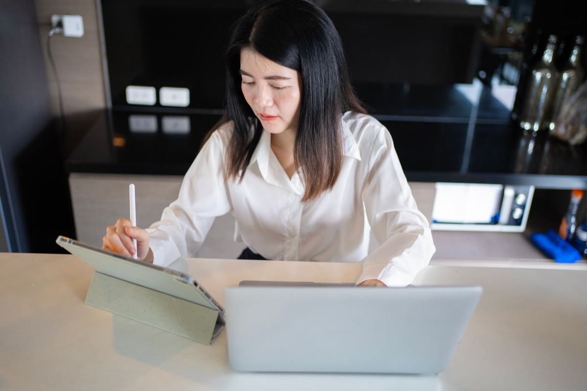 Thai businesswoman in office wearing traditional clothing